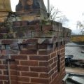 Chimney stack in poor state of repair.