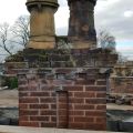 Chimney stack in poor state of repair.