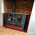 La Nordica Rosetta Sinistra Bii wood burning cooker with left flue outlet.